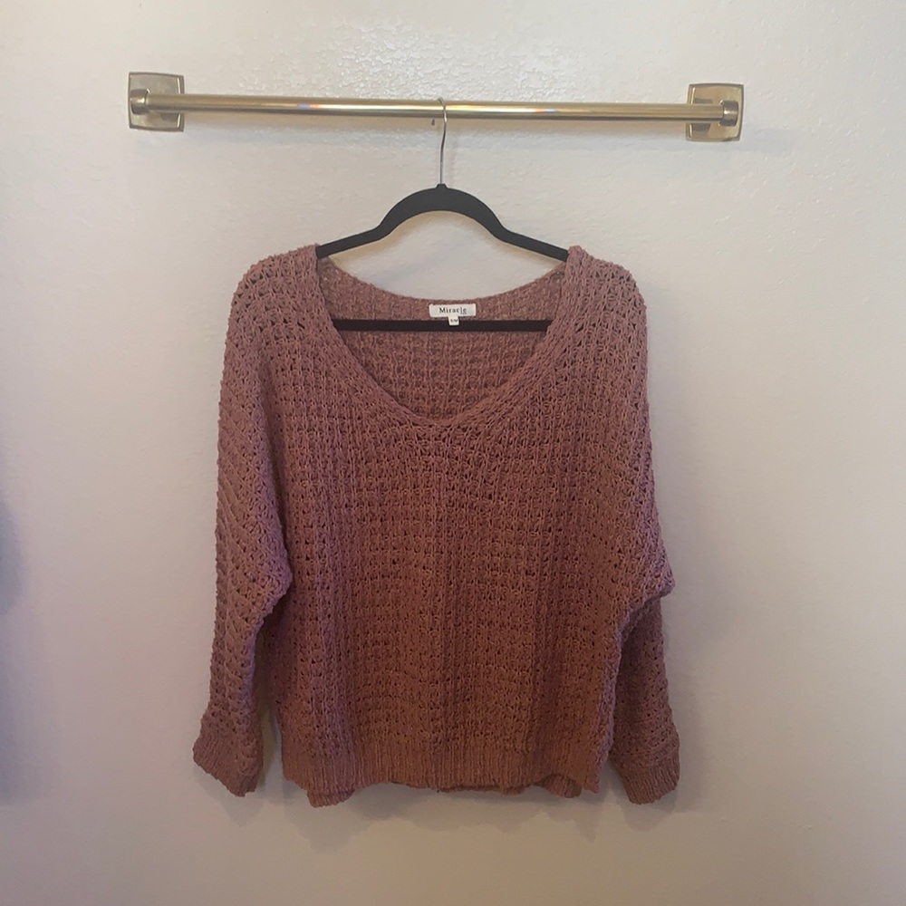 Tilly’s pink oversized sweater